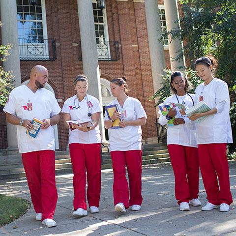 Nursing students standing outside McCord