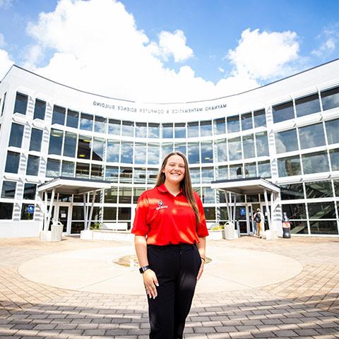 Math student stands in front of Maynard